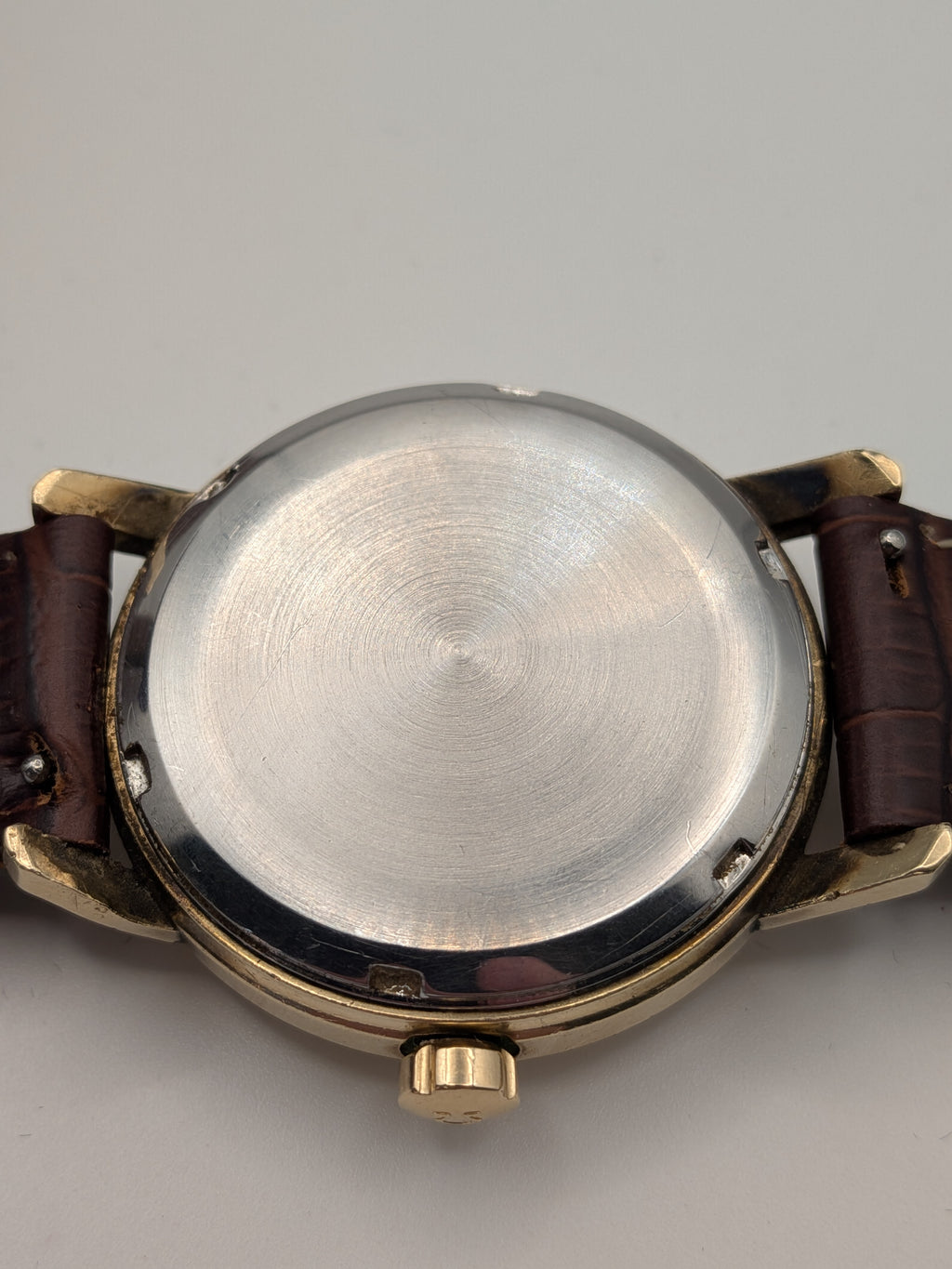 Gold Omega w/ brown strap