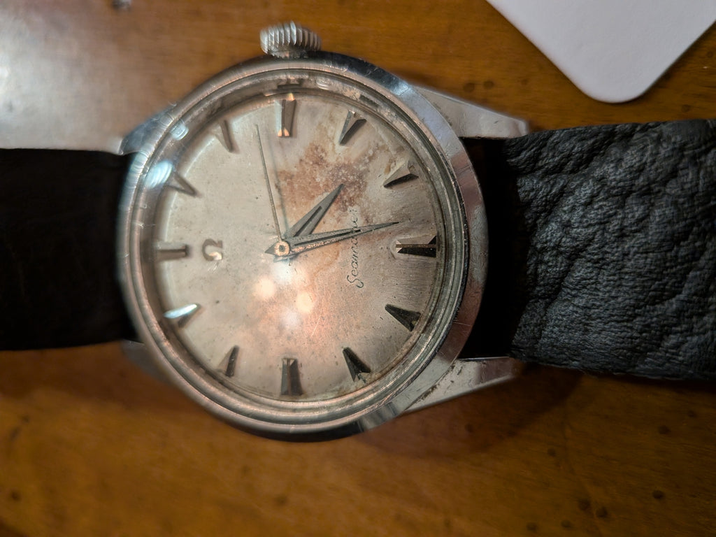 Omega Seamaster - keystone patina dial, silver, black strap