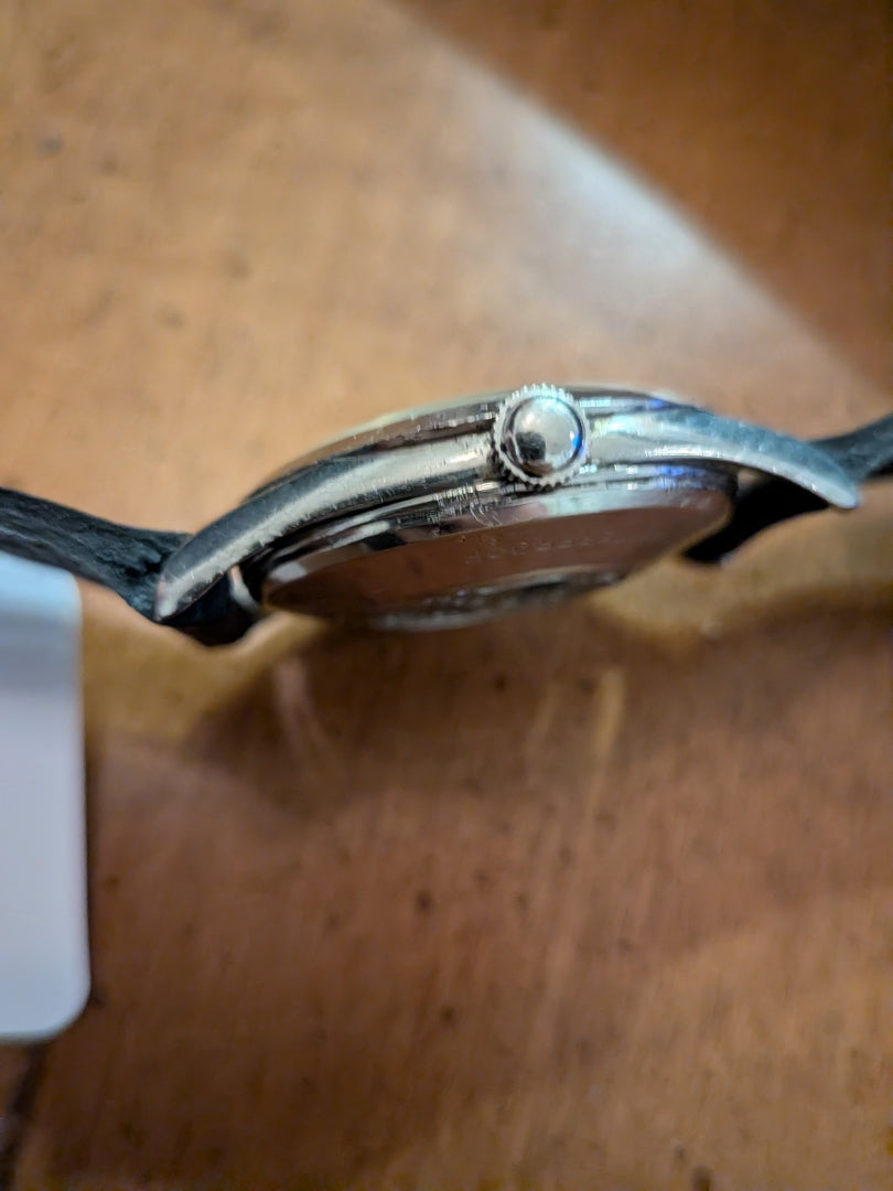 Omega Seamaster - keystone patina dial, silver, black strap