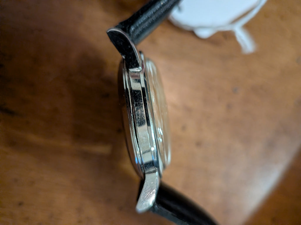 Omega Seamaster subseconds silver case